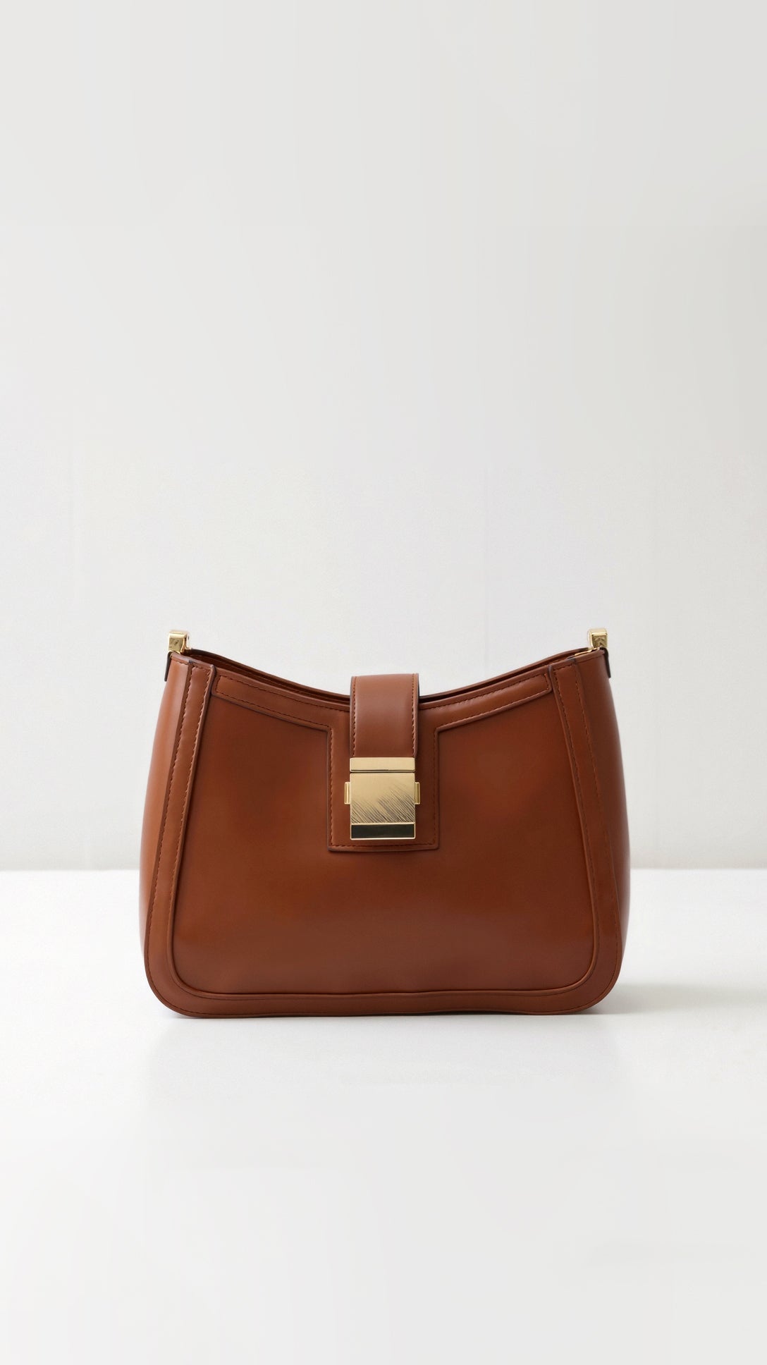 Leather Craft Shoulder Bag with Gold Details and Signature Buckle - Black and Cognac